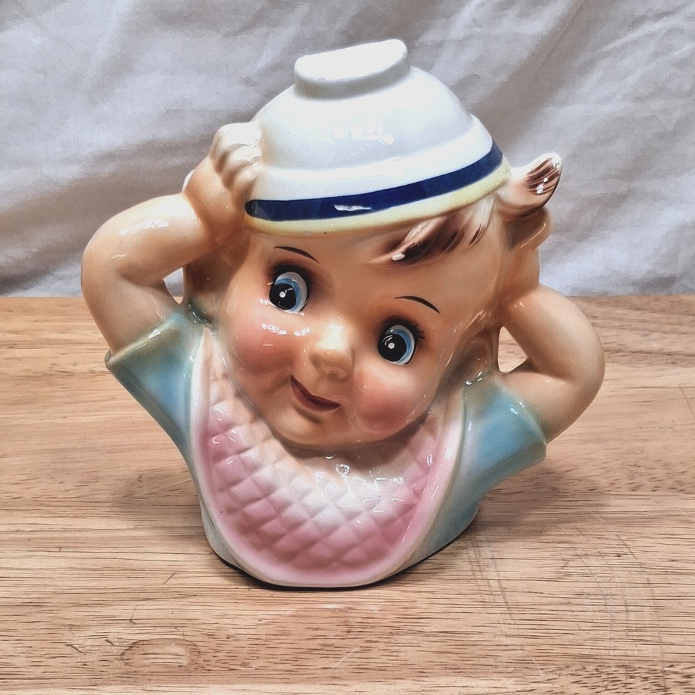Relpo Ceramic Baby w/Bib Putting Bowl on Head Samson Import Co 1957 313C